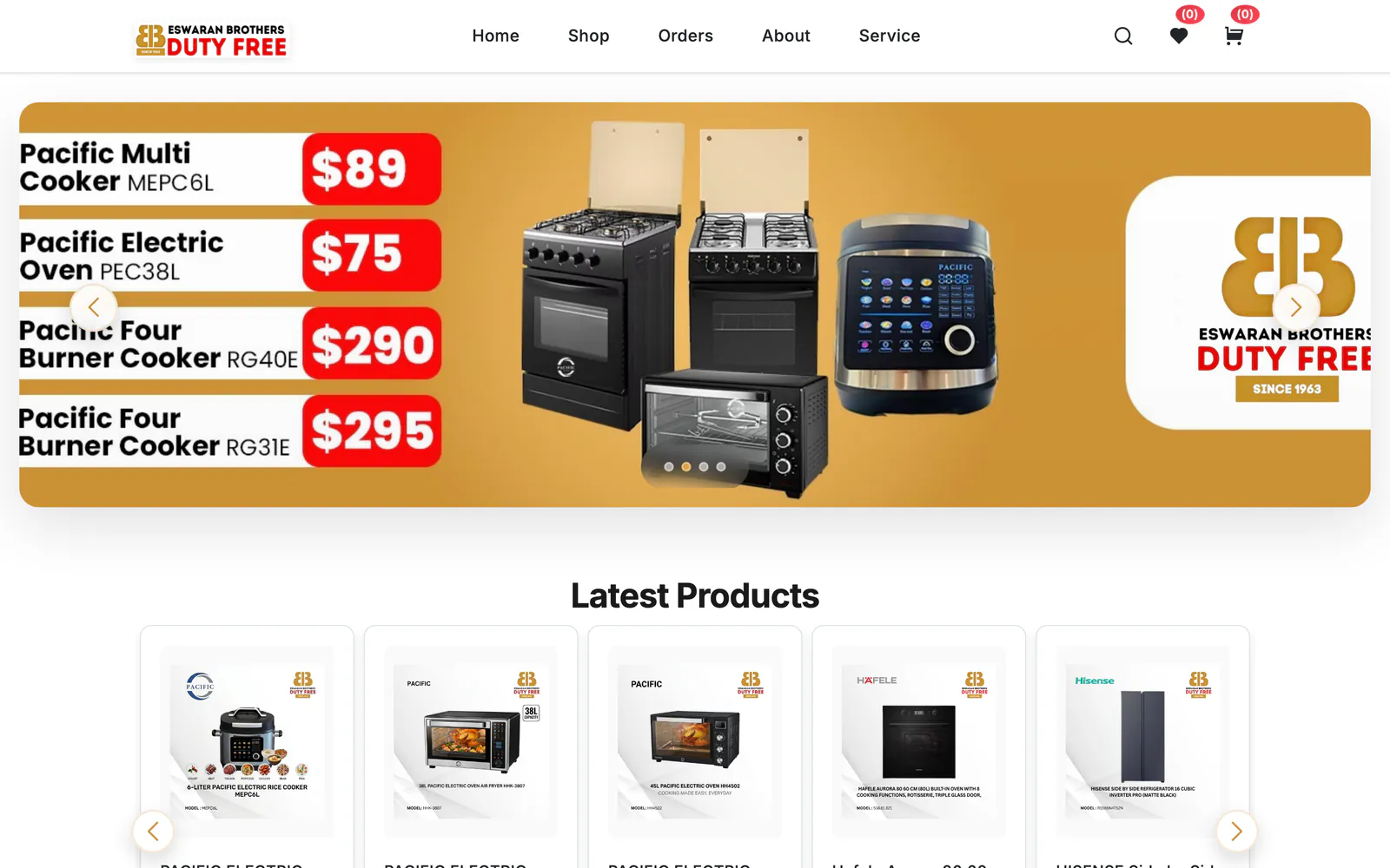 Eswaran Brothers Duty Free home page with a promotional price banner for cookers and ovens and Latest Products, on a laptop