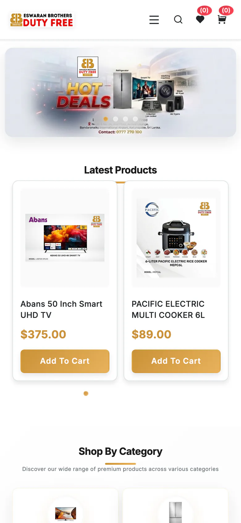 Eswaran Brothers Duty Free home page with a promotional price banner for cookers and ovens and Latest Products, on a phone